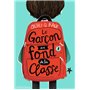 Le garçon au fond de la classe