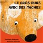 Le gros ours avec des taches