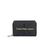 Calvin Klein Porte - monnaie en cuir PU à logo embossé Femme