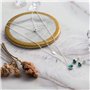 Philip Jones Ensemble collier et boucles d'oreilles avec pierre de naissance de mai (émeraude) créé avec des cristaux Zircondia®