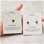 Philip Jones Ensemble collier et boucles d'oreilles avec pierre de naissance de juillet (rubis) créés avec des cristaux Zircondi