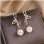 BKEPDY Boucles d'Oreilles Femme avec Nœud Pendantes Longues en Acier Inoxydable de Haute Qualité et Plaqué Or Hypoallergénique a