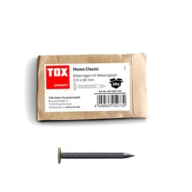 Clou à image Home Classic TOX en acier trempé avec tête en laiton dans un emballage en papier recyclable