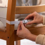 INGENUITY Rehausseur de chaise deluxe pliable gris, nomade avec tablette et sangles inclus